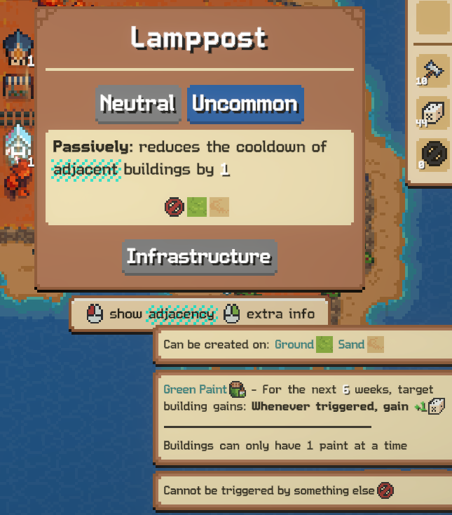 Lamppost card already carrying an applied Green Paint, with extra info panels listing the paint’s triggered reward and the rule that buildings can only hold one paint at a time